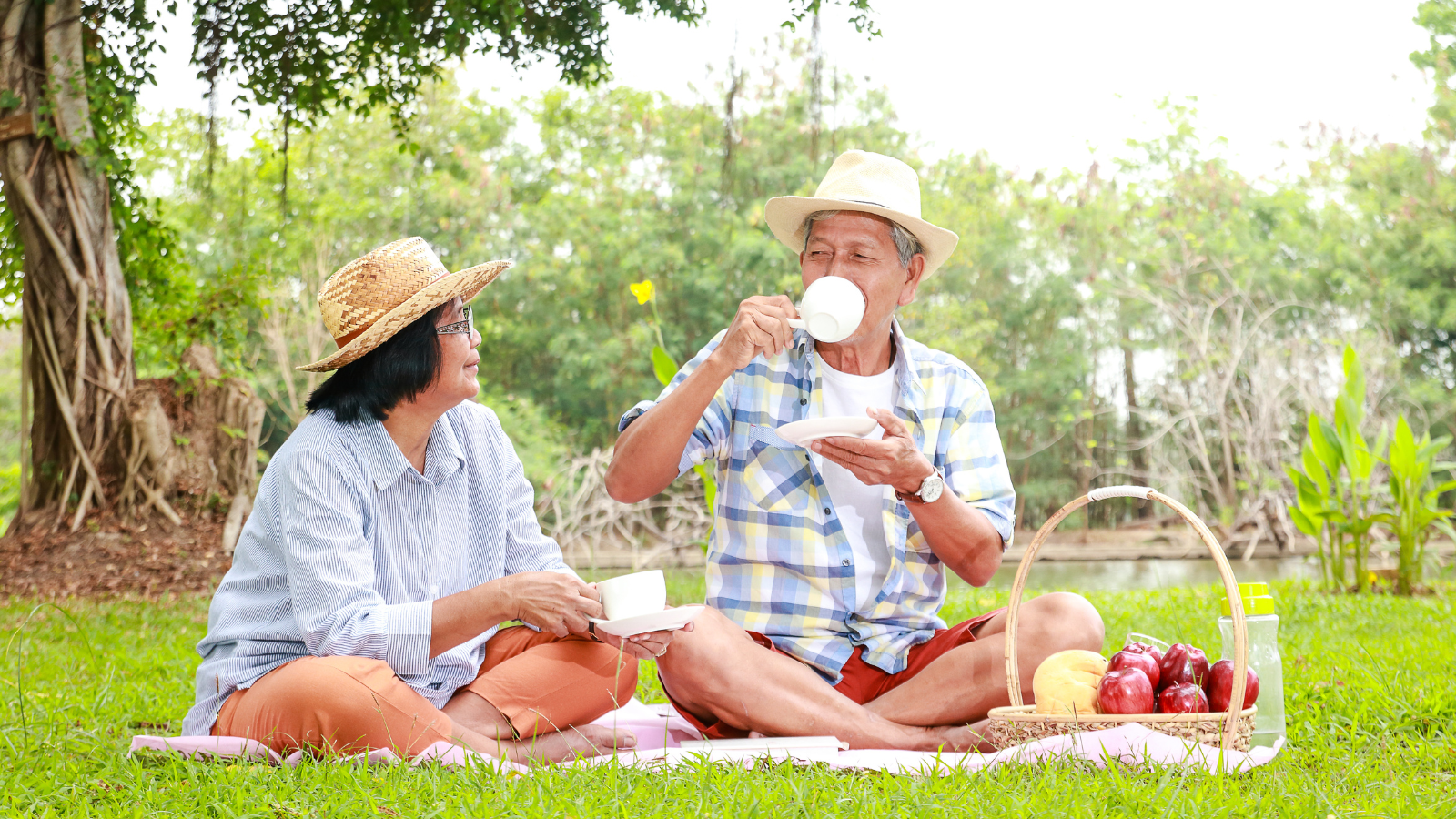 "An elderly couple working in the garden or enjoying afternoon tea, representing retirement life."